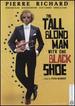 The Tall Blonde Man With One Black Shoe