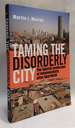 Taming the Disorderly City: the Spatial Landscape of Johannesburg After Apartheid